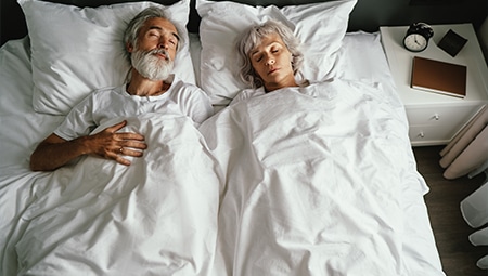 couple sleeping in bed